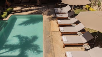 Outdoor pool, open 9:00 AM to 9:00 PM, sun loungers