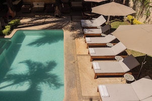 Outdoor pool, open 9:00 AM to 9:00 PM, sun loungers