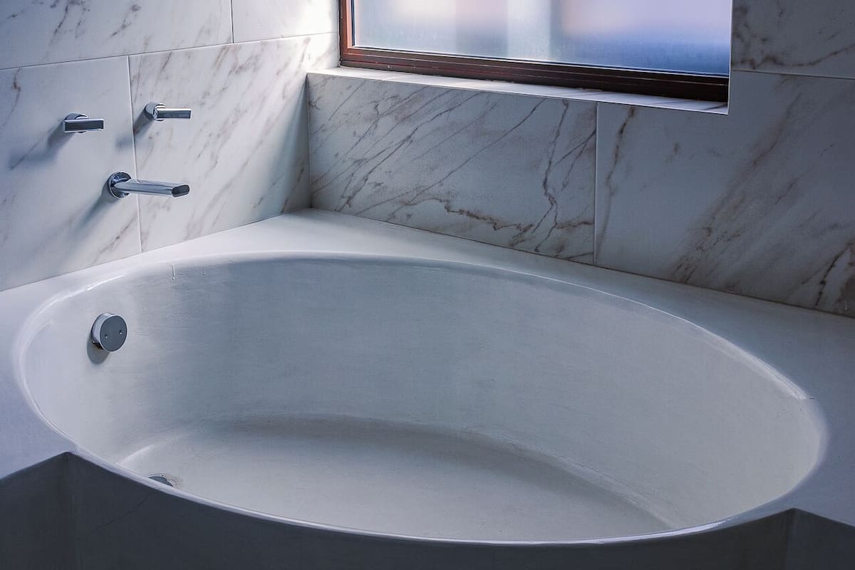 suite | bathroom | designer toiletries, hair dryer, bathrobes, slippers