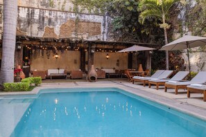 Outdoor pool, open 9:00 AM to 9:00 PM, sun loungers