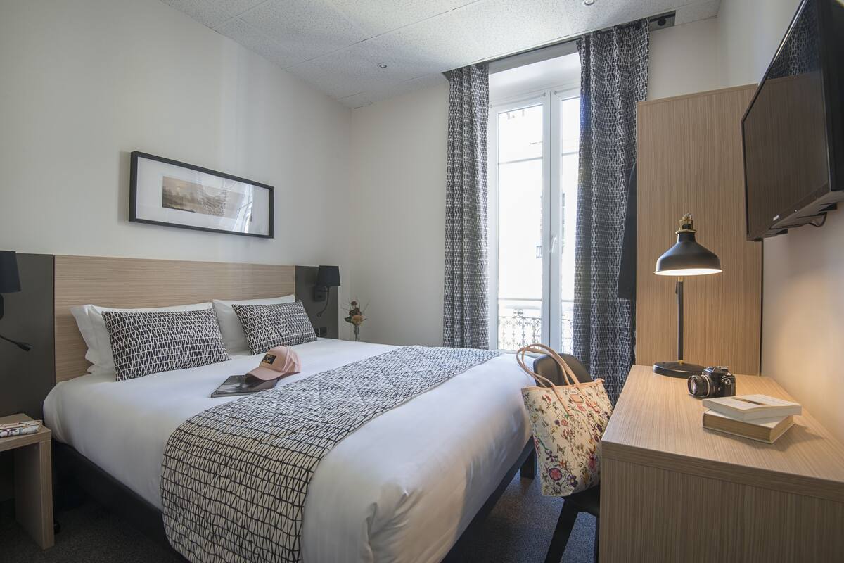 Camas con pillow-top, minibar y caja de seguridad en la habitación 