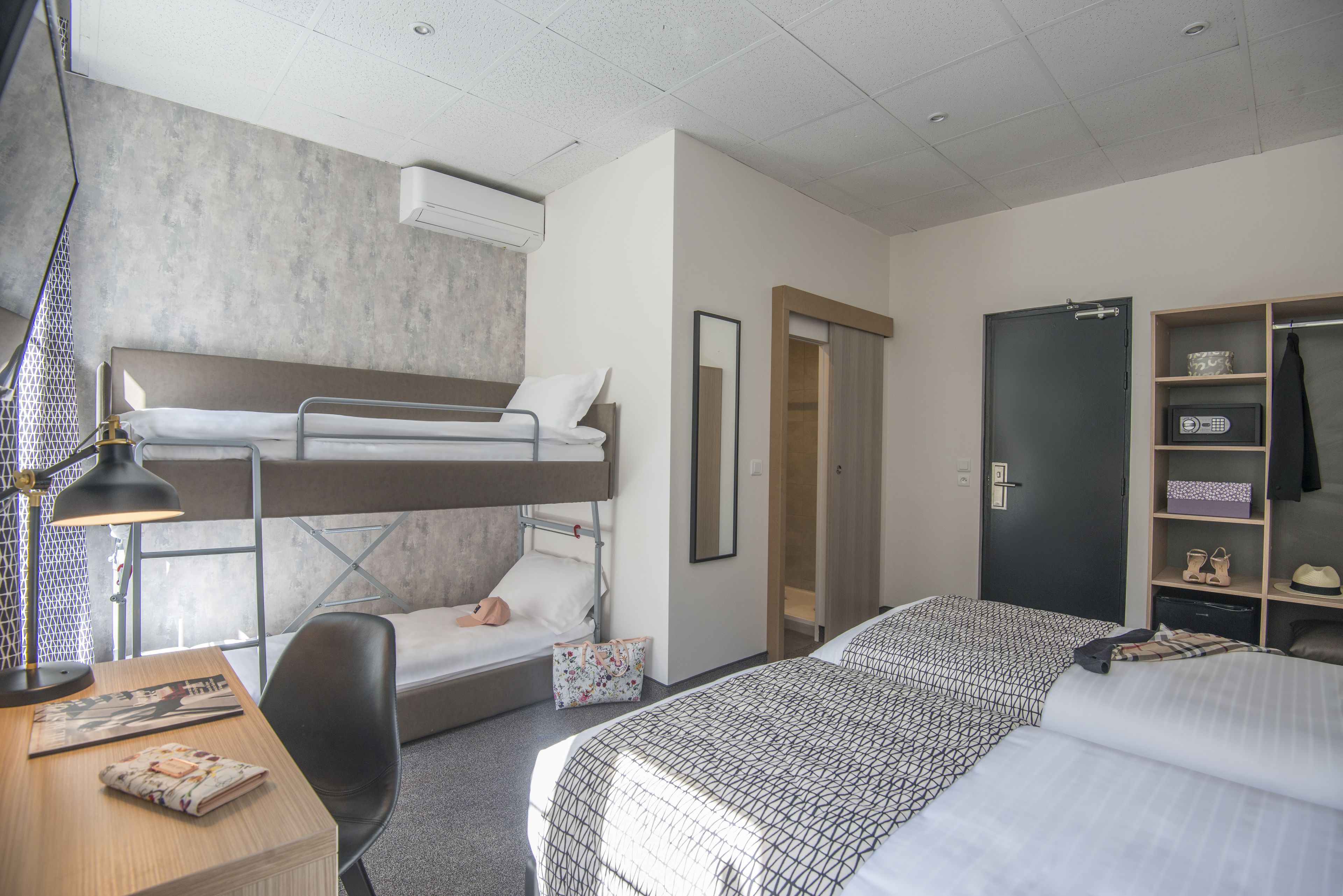 quadruple room | pillow-top beds, minibar, in-room safe, desk