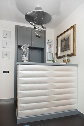 32-inch TV with satellite channels, pay movies