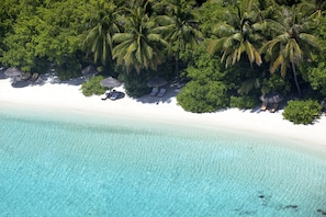 Deluxe Villa | Beach | On the beach, white sand, sun loungers, beach umbrellas