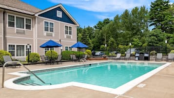 Seasonal outdoor pool, open 8:00 AM to 10:00 PM, pool umbrellas