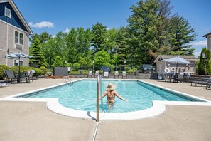 Seasonal outdoor pool, open 8:00 AM to 10:00 PM, pool umbrellas