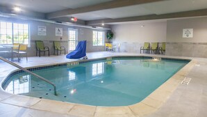 An indoor swimming pool with clear signage, including a lifeguard warning and no diving allowed. - Holiday Inn Express & Suites Jackson by IHG (Jackson)