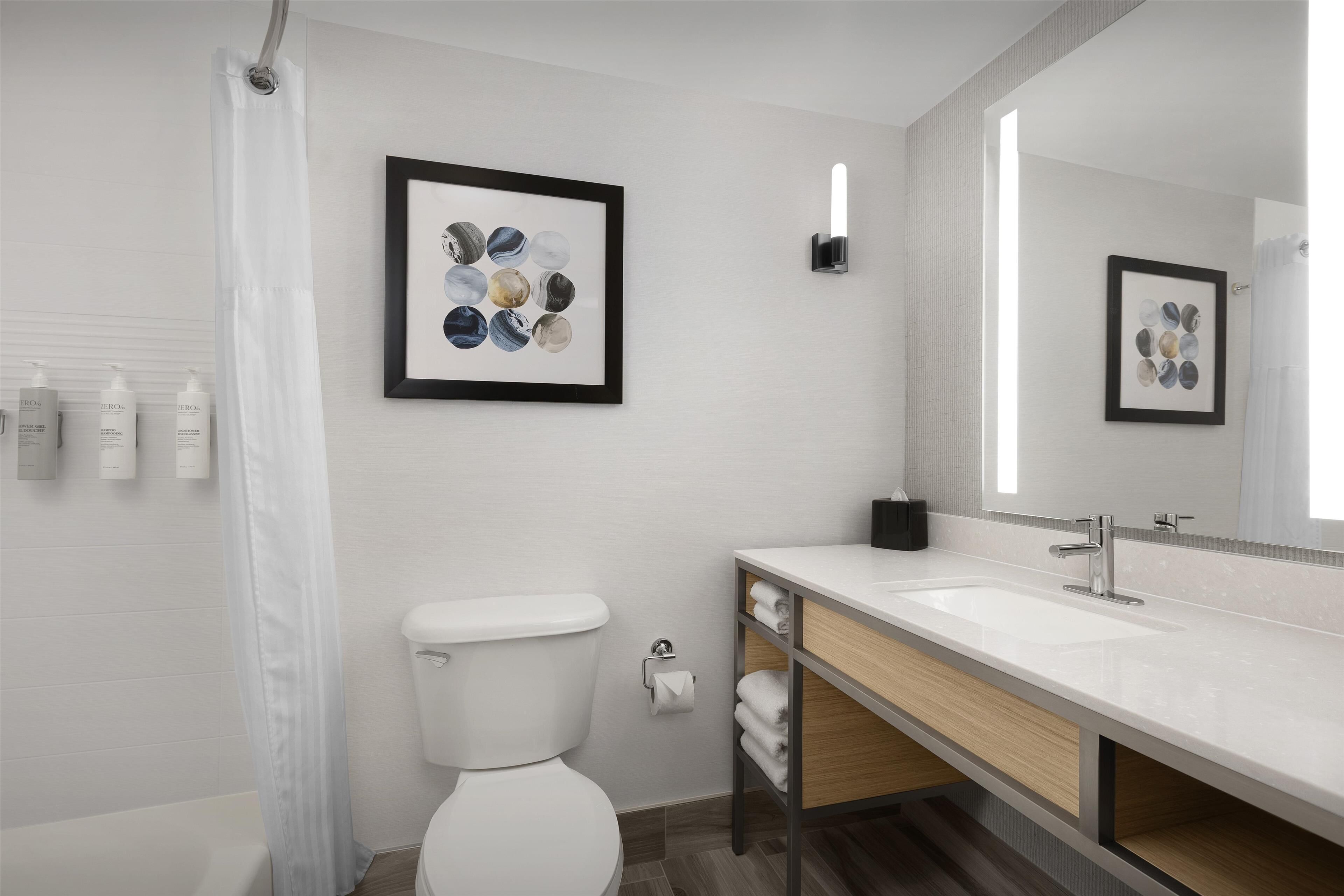 combined shower/bathtub, free toiletries, hair dryer, bathrobes