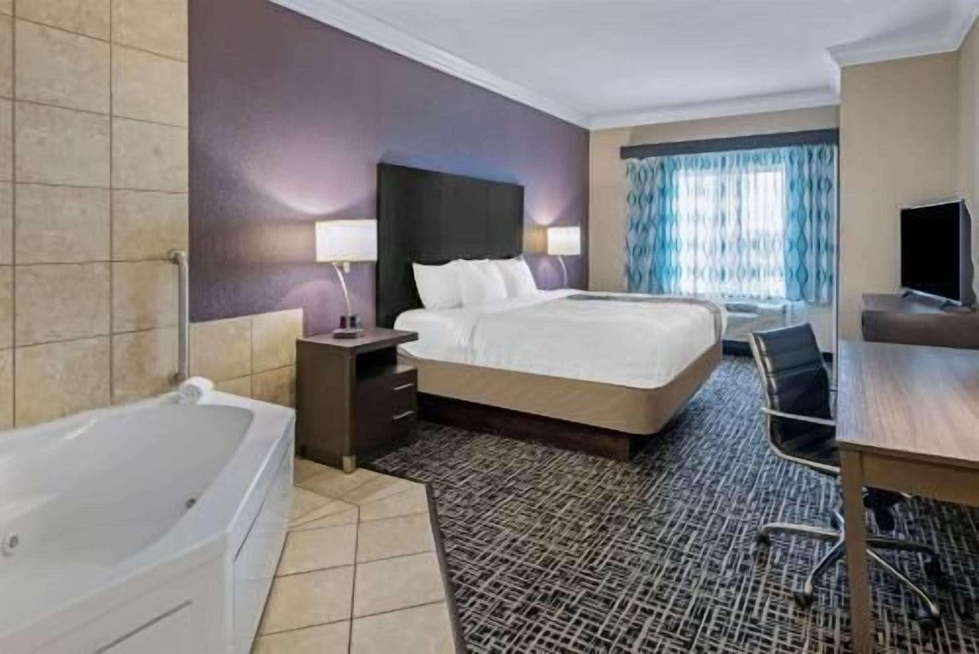 Premium bedding, down comforters, in-room safe, desk