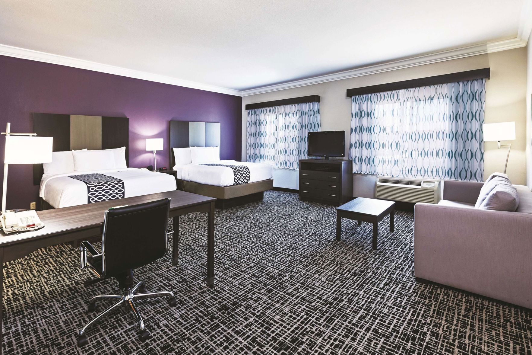 Premium bedding, down comforters, in-room safe, desk