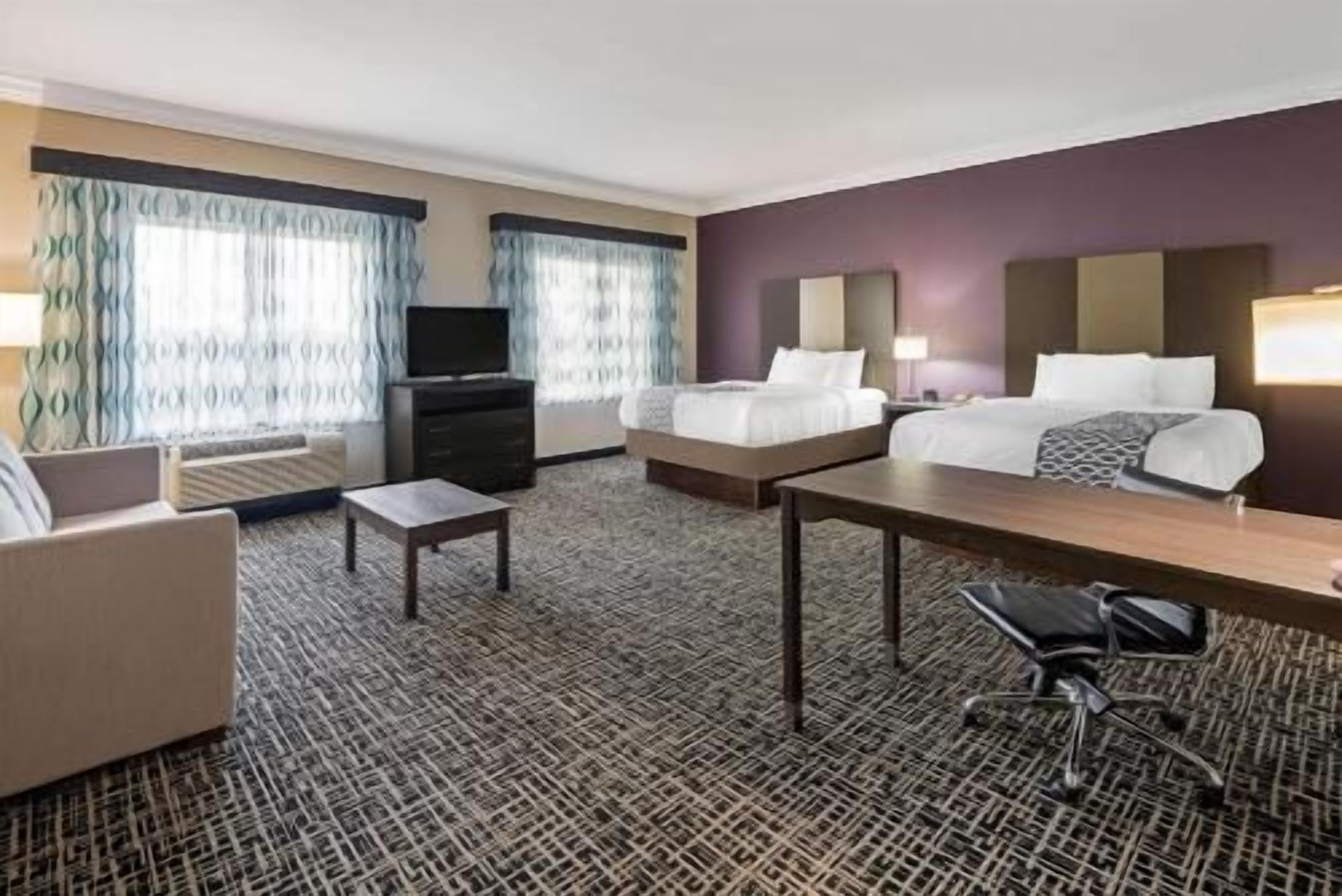 Premium bedding, down comforters, in-room safe, desk
