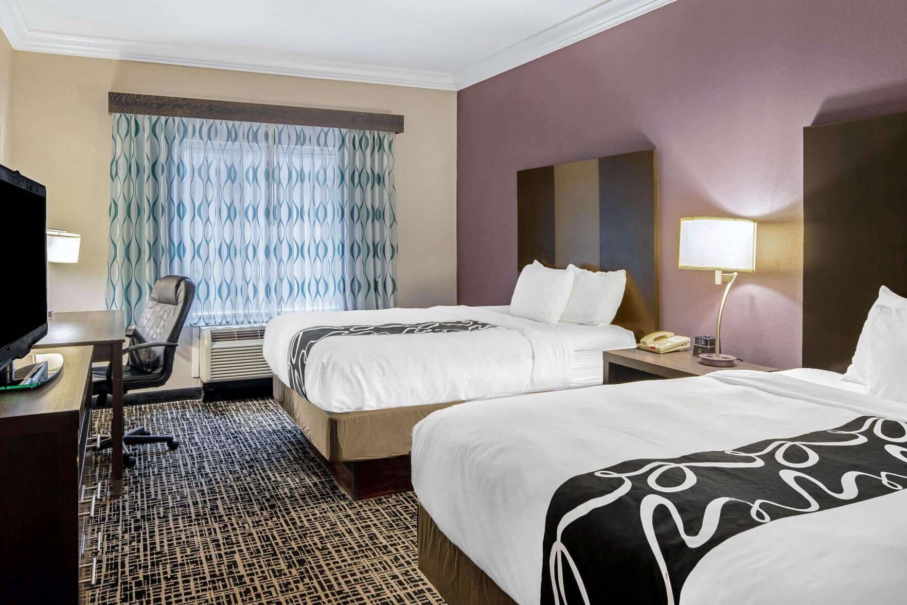Premium bedding, down comforters, in-room safe, desk