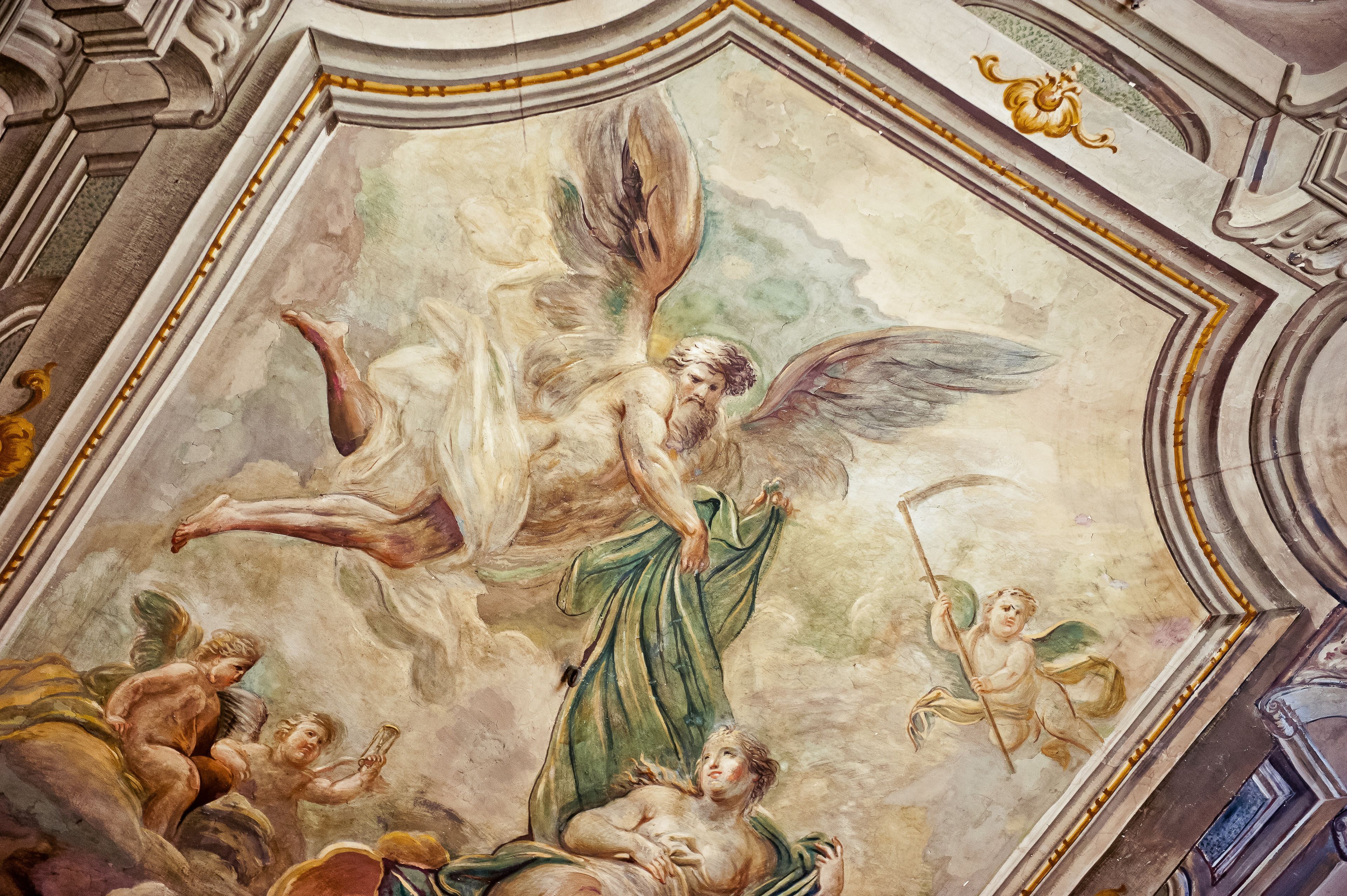 A detailed fresco mural on a ceiling, featuring mythological figures and classical architecture.