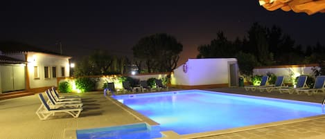 Outdoor pool, pool umbrellas, pool loungers