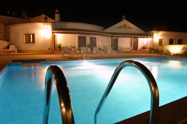 Outdoor pool, pool umbrellas, sun loungers