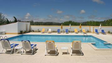 Outdoor pool, pool umbrellas, sun loungers