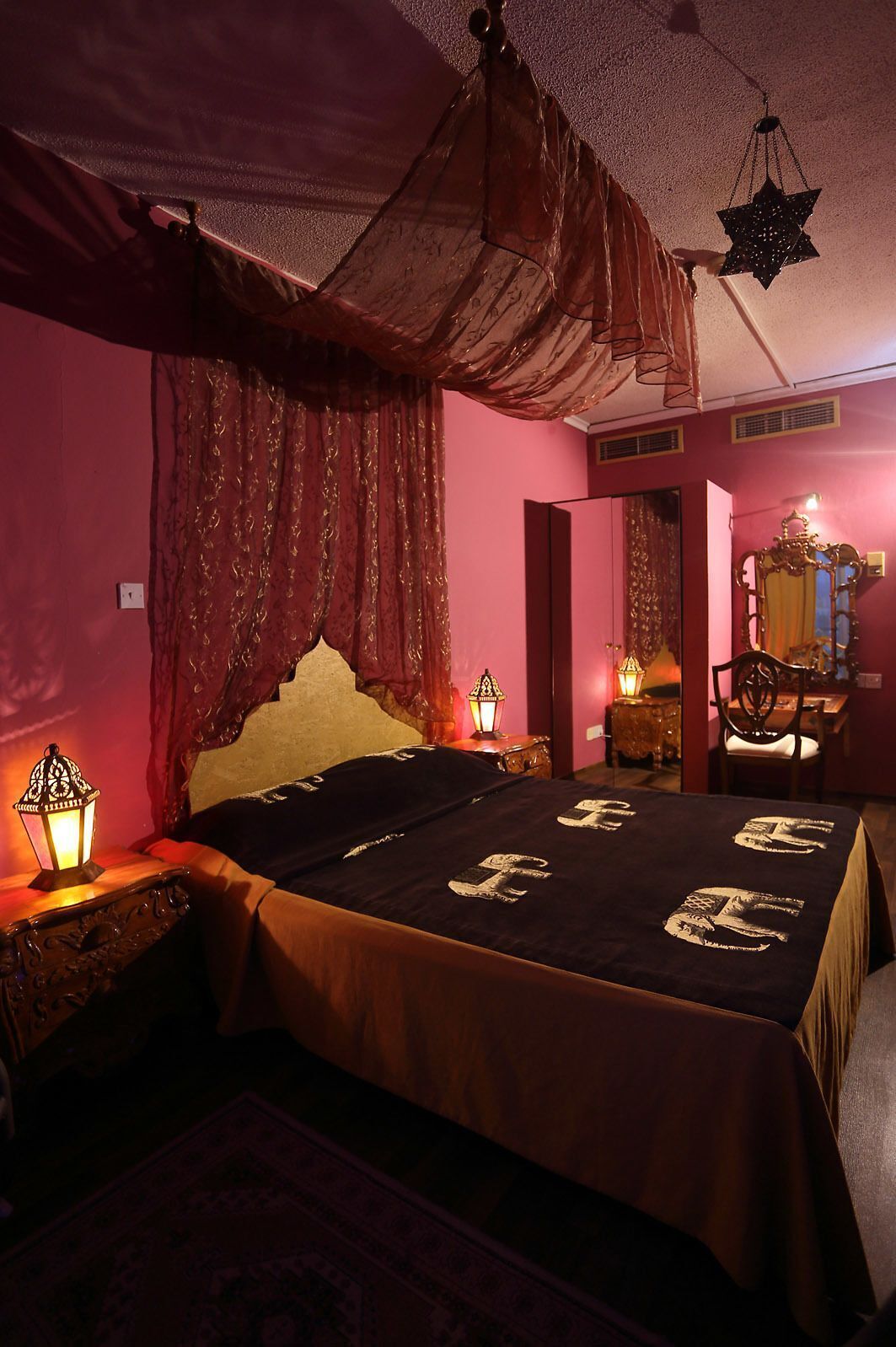 Desk, blackout curtains, bed sheets