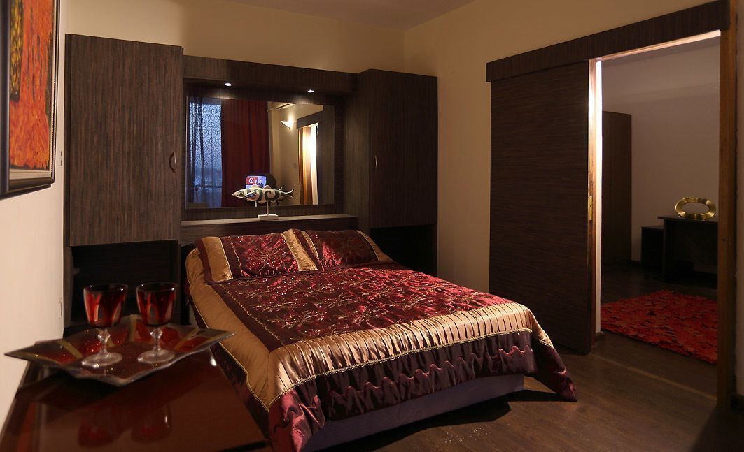 Desk, blackout curtains, bed sheets