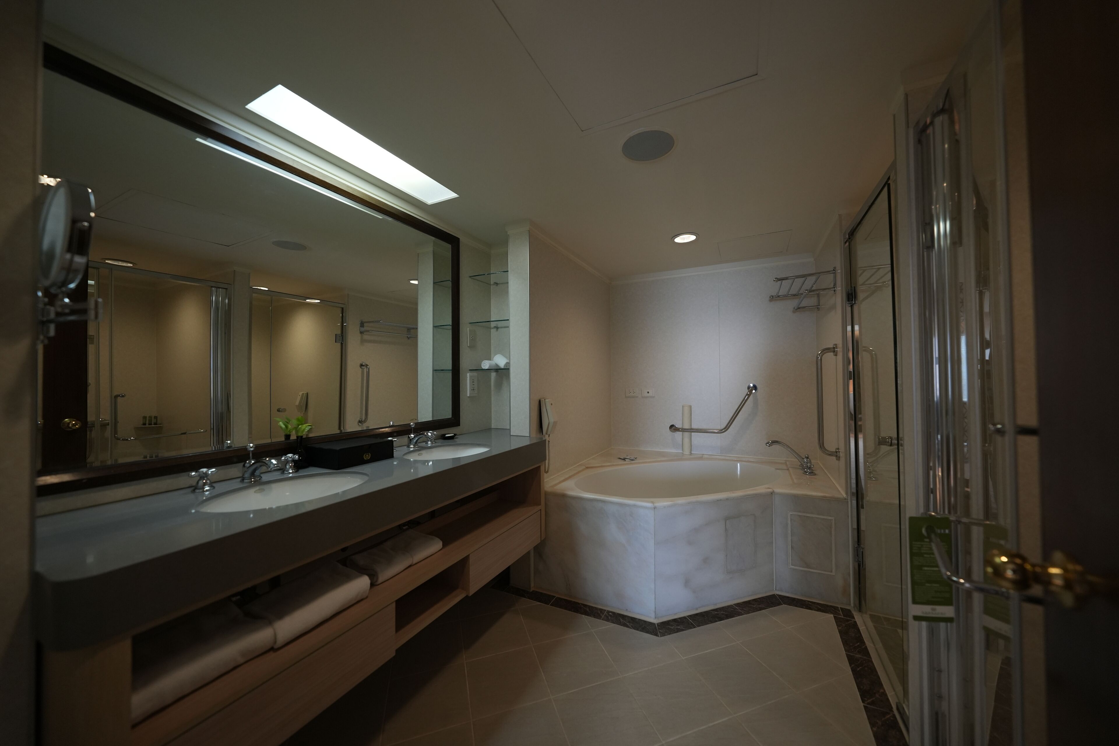 royal suite | bathroom | deep-soaking bathtub, free toiletries, hair dryer, slippers