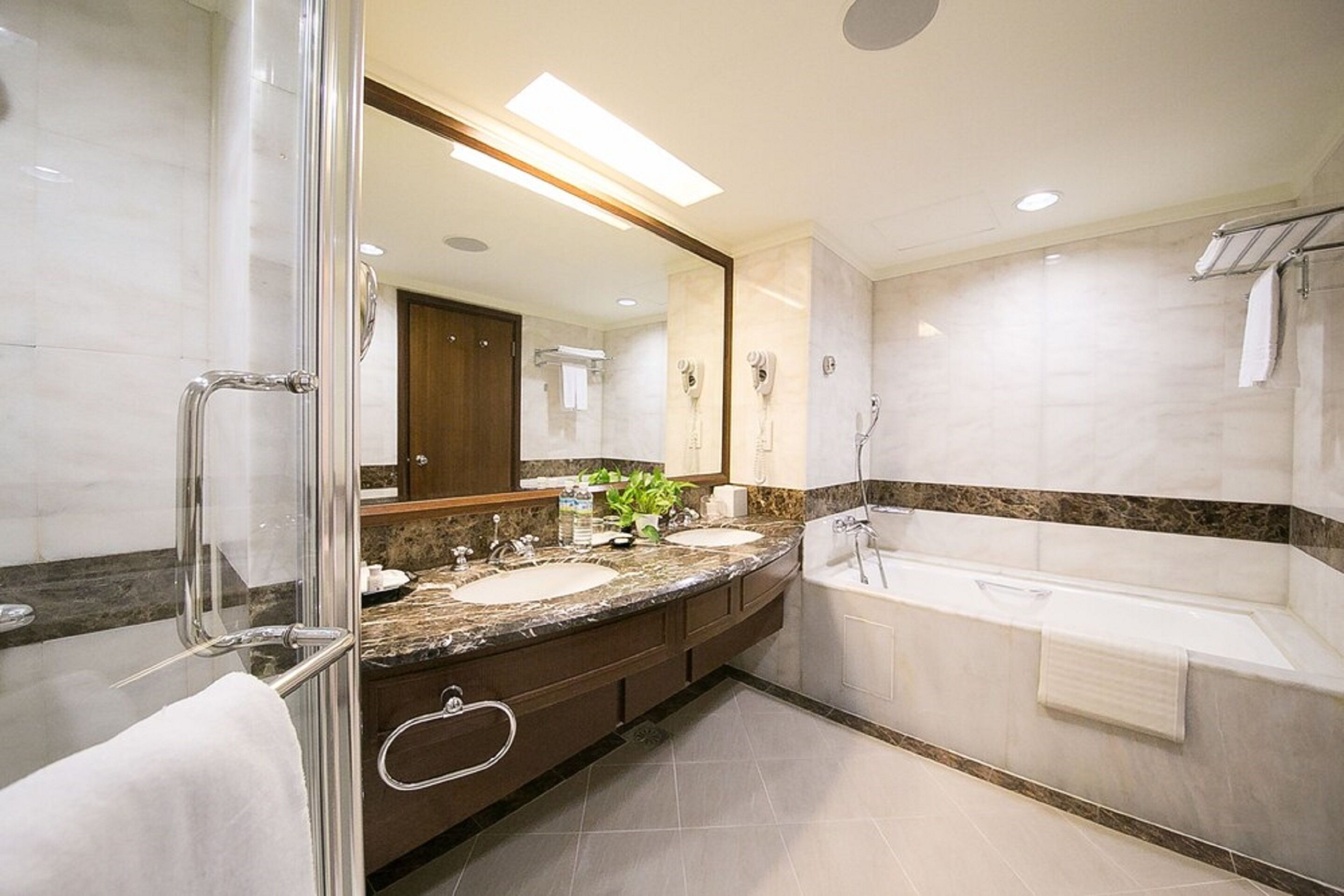 family suite | bathroom | deep-soaking bathtub, free toiletries, hair dryer, slippers