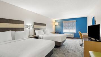 Habitación estándar, 2 camas Queen size | 1 habitación, caja de seguridad en la habitación y escritorio