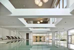 Indoor pool, seasonal outdoor pool, pool umbrellas, sun loungers