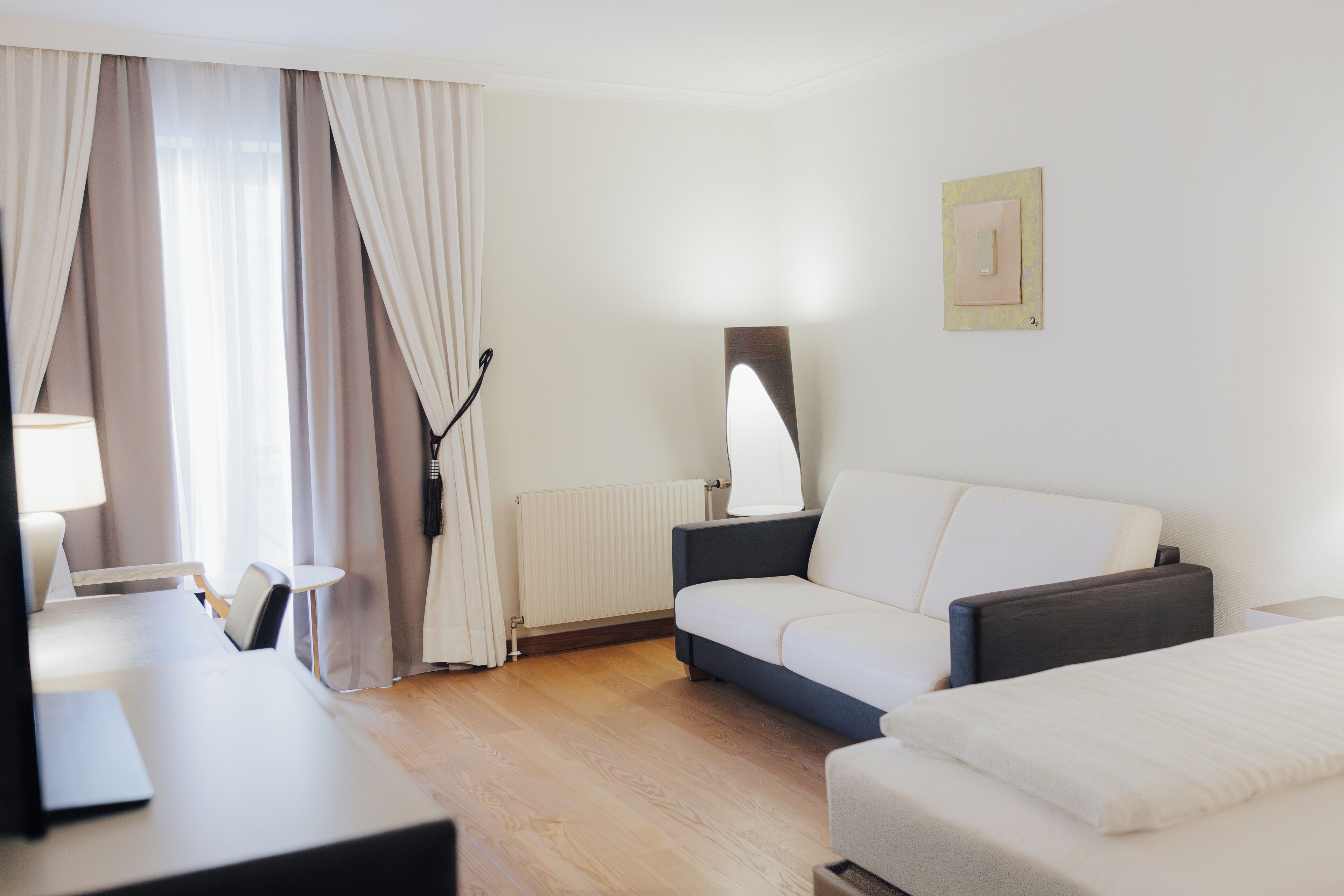 family room | premium bedding, minibar, in-room safe, desk