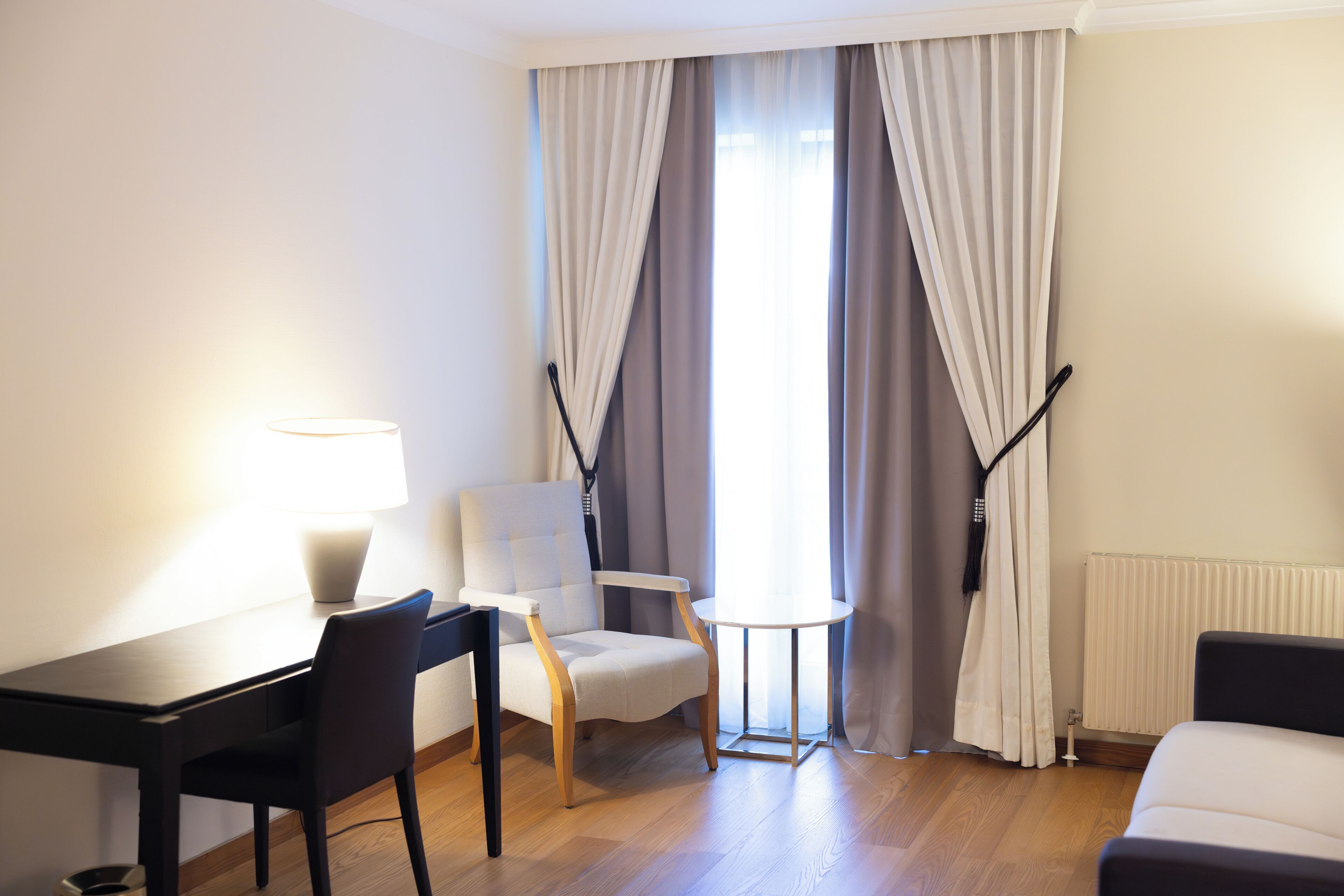 family room | premium bedding, minibar, in-room safe, desk