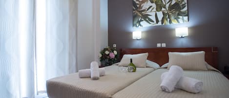 Premium bedding, pillow-top beds, minibar, desk