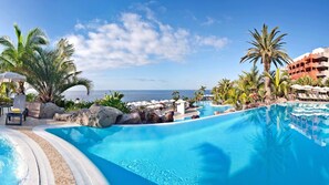 2 outdoor pools, pool umbrellas, sun loungers