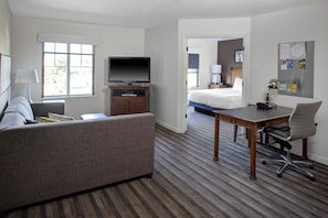 Premium bedding, pillow-top beds, desk, laptop workspace