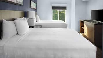 Premium bedding, pillow-top beds, desk, laptop workspace