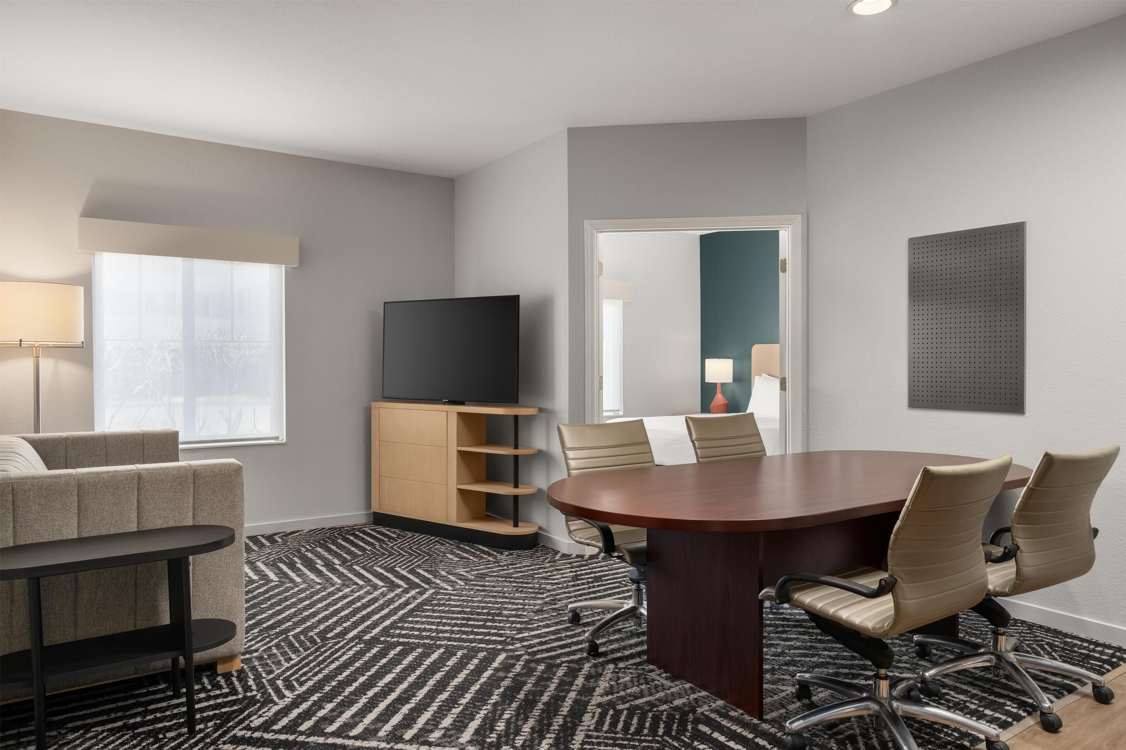 Premium bedding, pillowtop beds, desk, laptop workspace