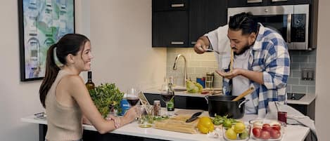 Premium bedding, pillow-top beds, desk, laptop workspace