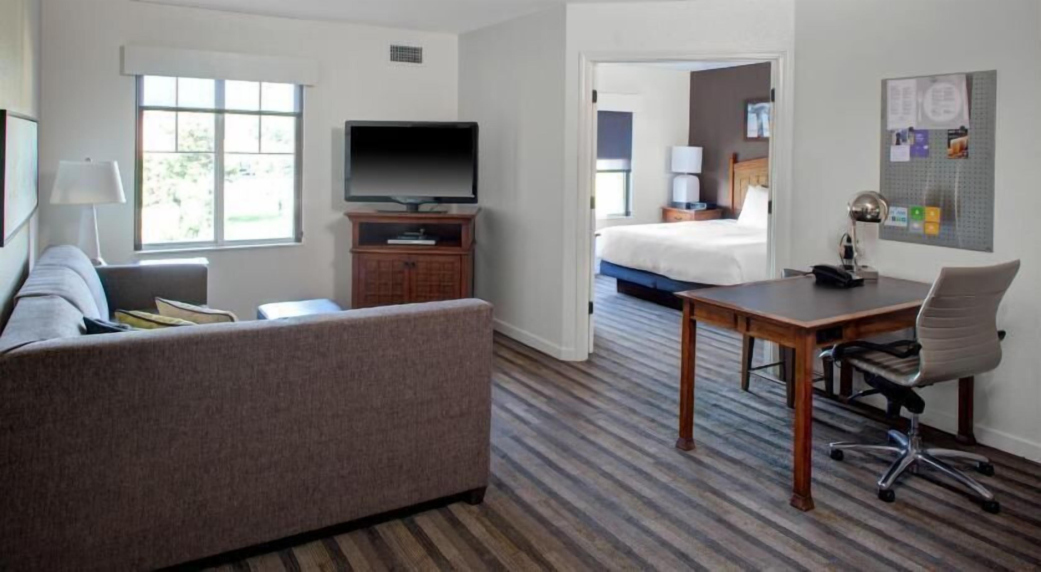 Premium bedding, pillowtop beds, desk, laptop workspace