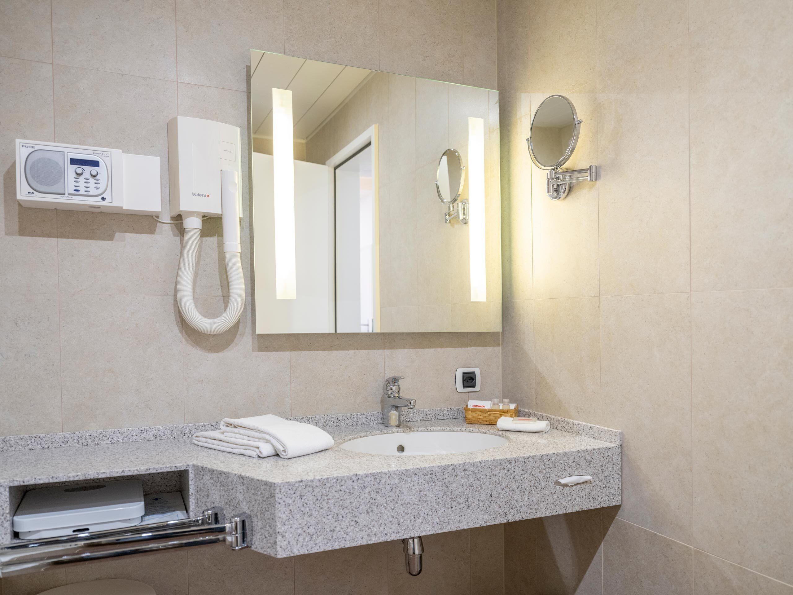 combined shower/bathtub, designer toiletries, hair dryer, dressing gowns