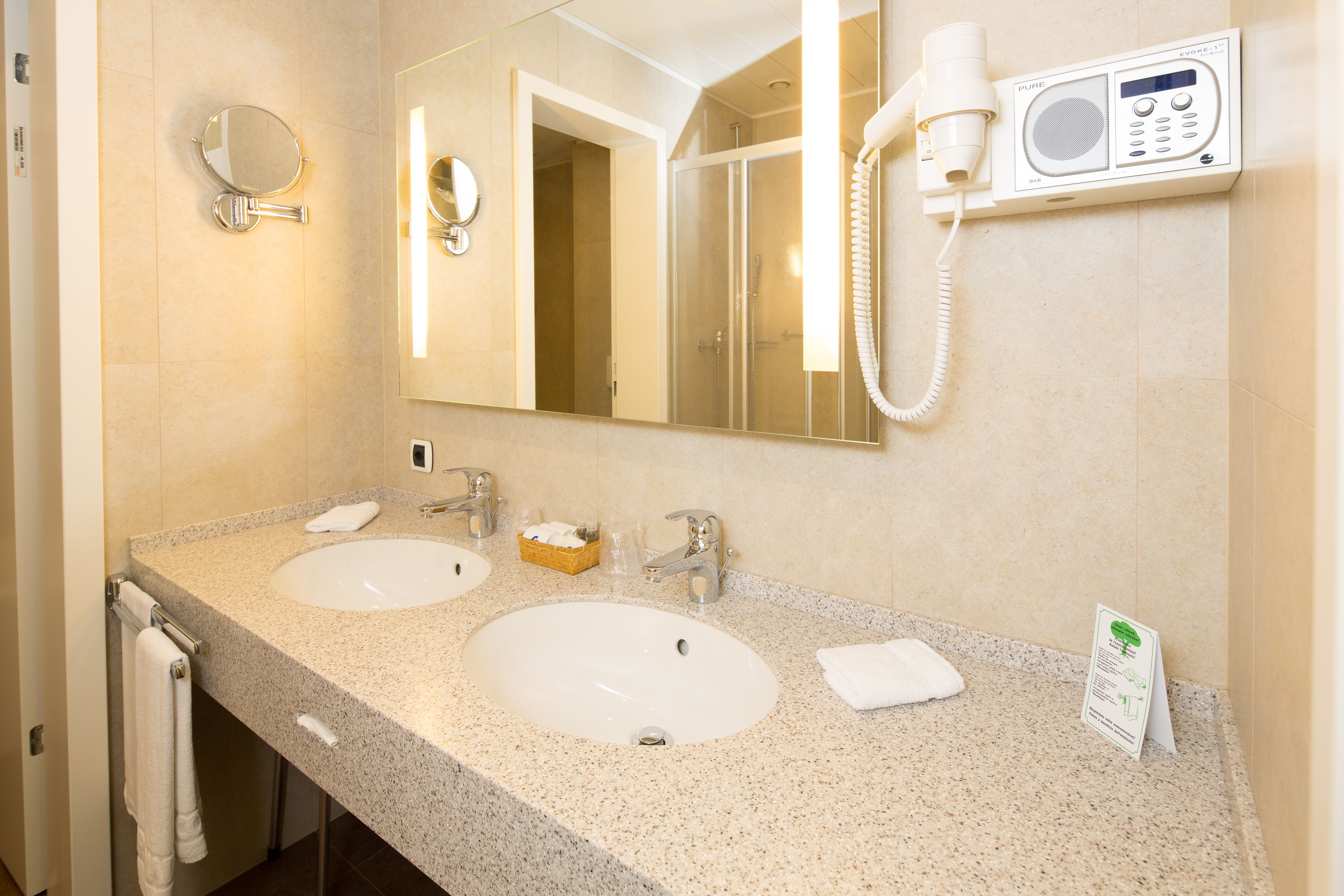 combined shower/bathtub, designer toiletries, hair dryer, dressing gowns