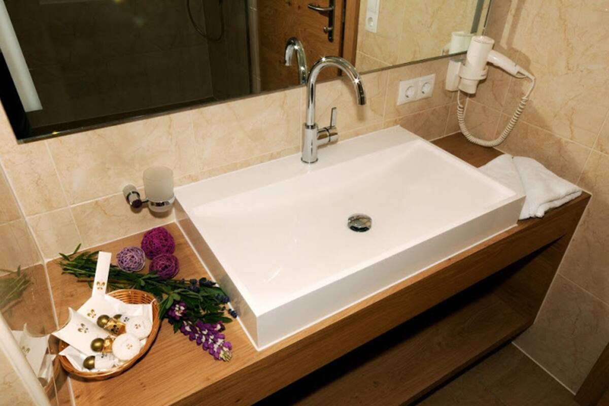 junior suite, balcony, mountain view | bathroom sink
