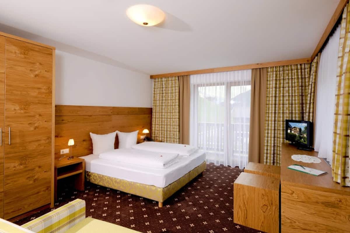 junior suite, balcony, mountain view | in-room safe, desk, free wifi, bed sheets