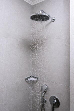 Shower, rainfall showerhead, hair dryer, towels
