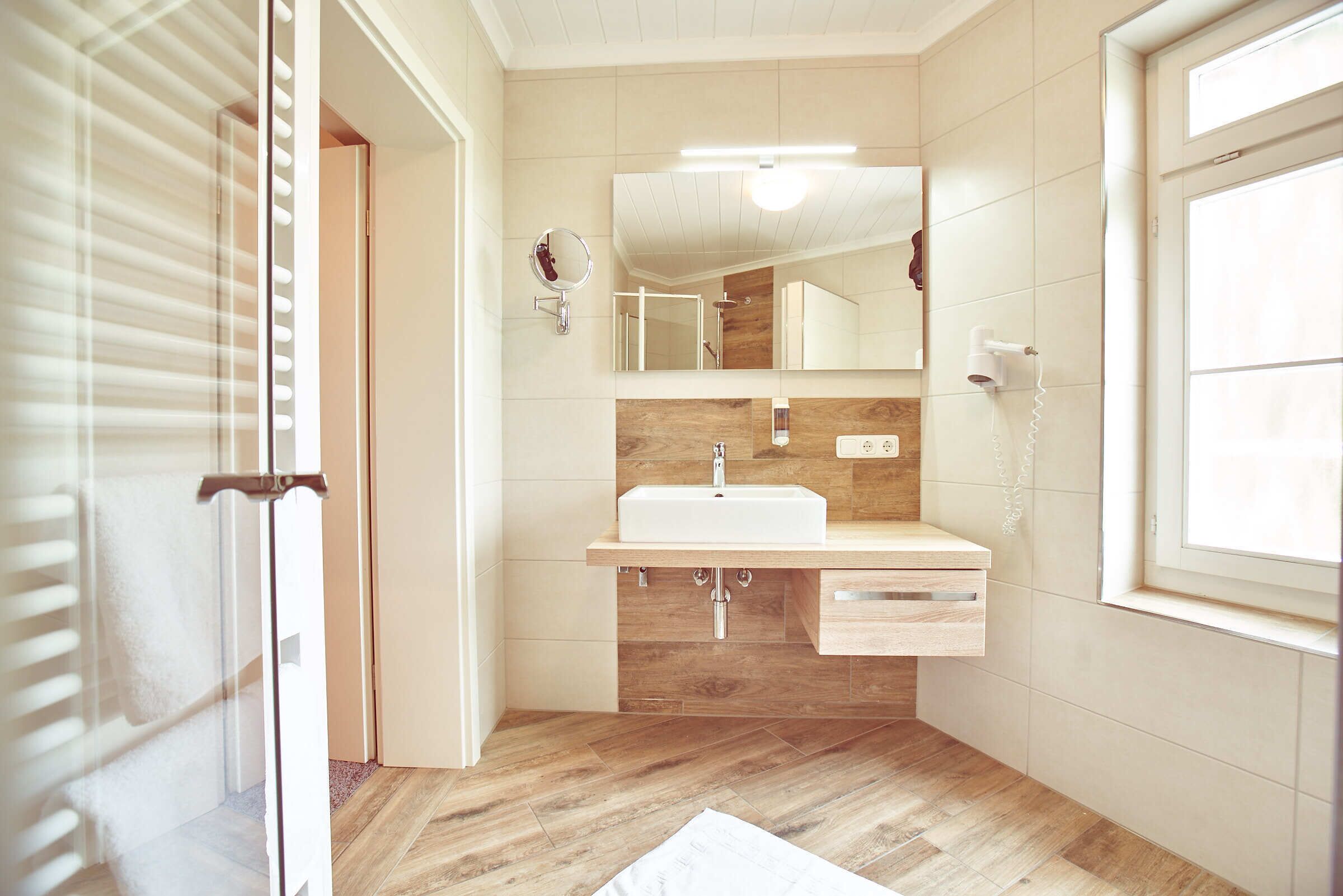 quadruple room | bathroom | shower, hair dryer, towels, shampoo
