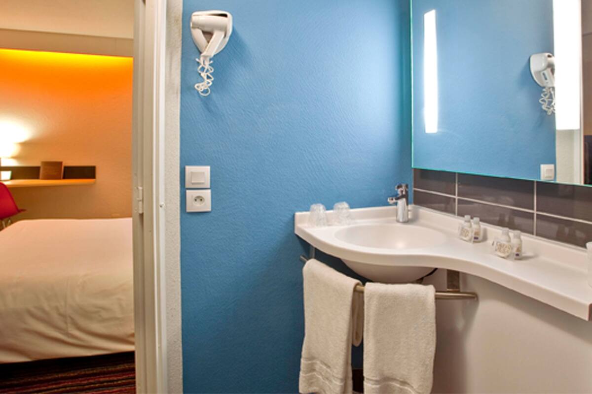 shower, eco-friendly toiletries, hair dryer, towels