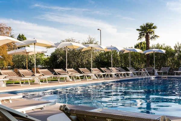 Outdoor pool, pool umbrellas, pool loungers