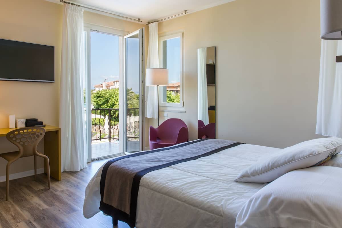 suite, terrace, lake view | 1 bedroom, minibar, in-room safe, individually decorated