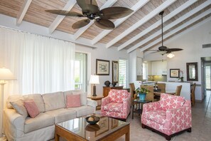 Deluxe Suite, 1 Bedroom, Partial Ocean View | Living area | TV