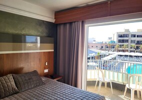 Twin Room, Pool View | In-room safe, desk, blackout drapes, iron/ironing board