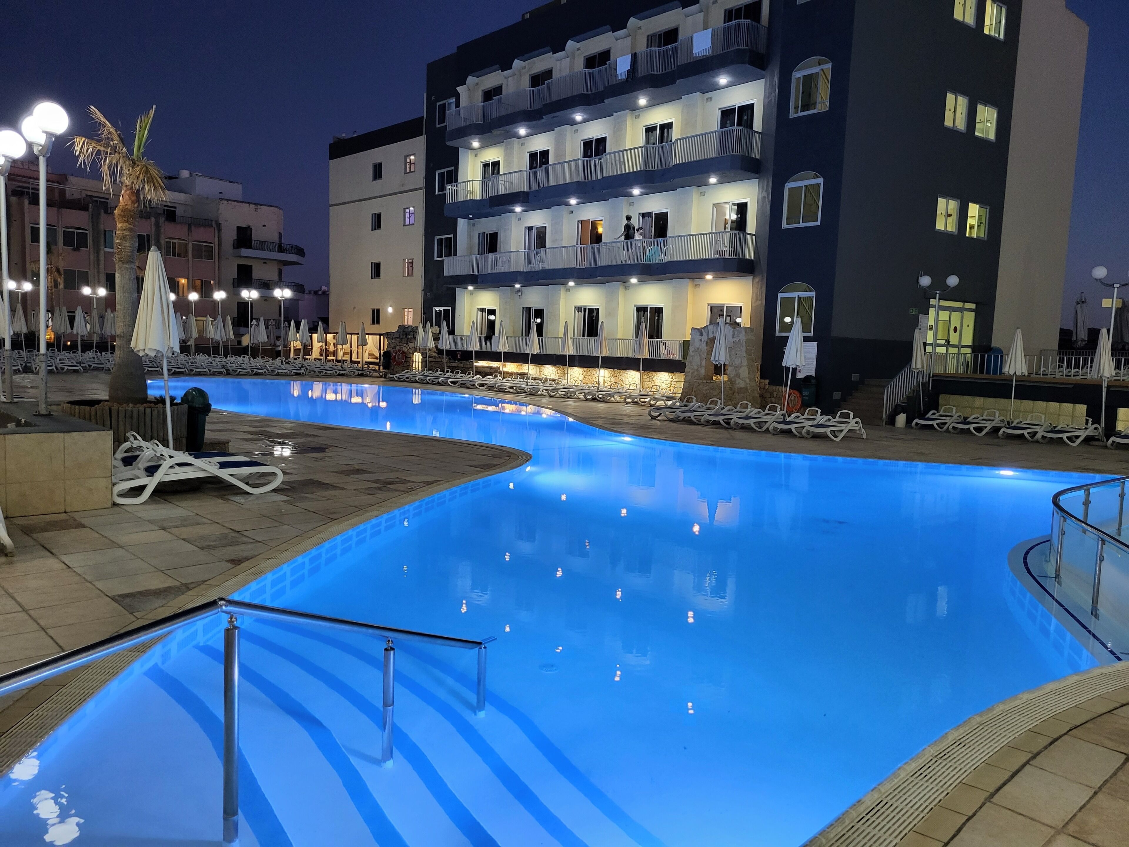 Indoor pool, outdoor pool, open 8:00 AM to 6:00 PM, pool umbrellas