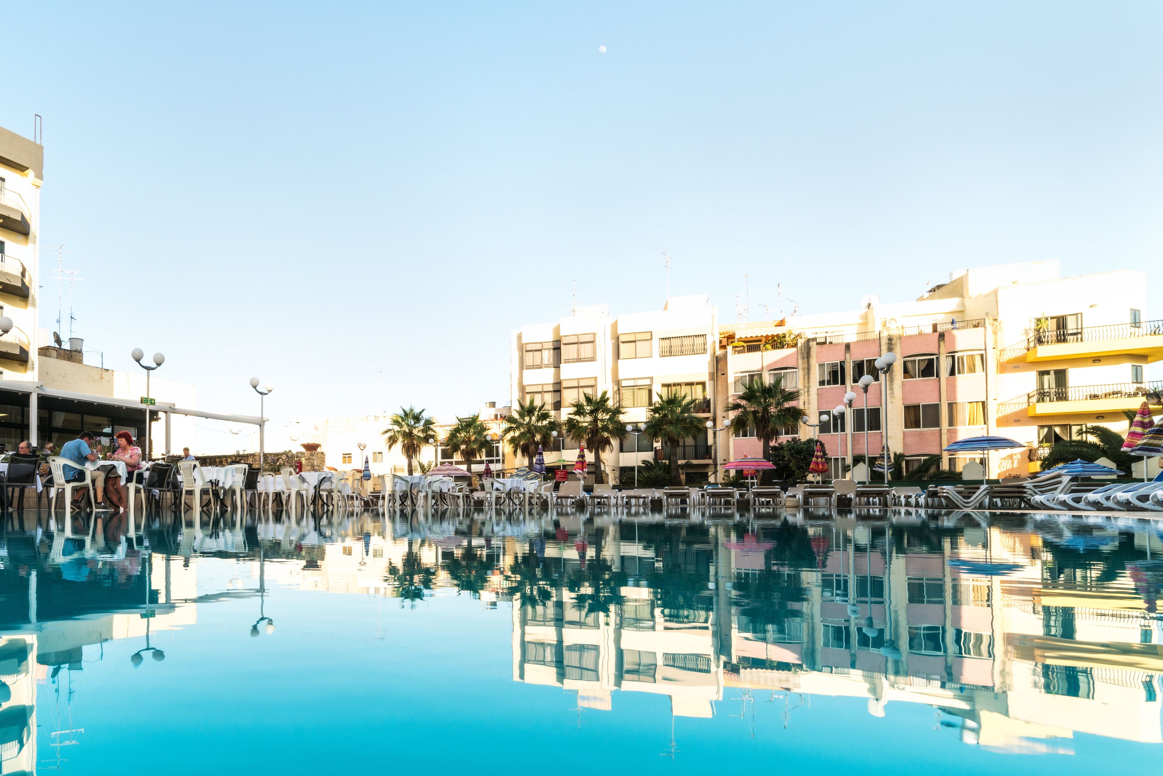 Indoor pool, outdoor pool, open 8:00 AM to 6:00 PM, pool umbrellas