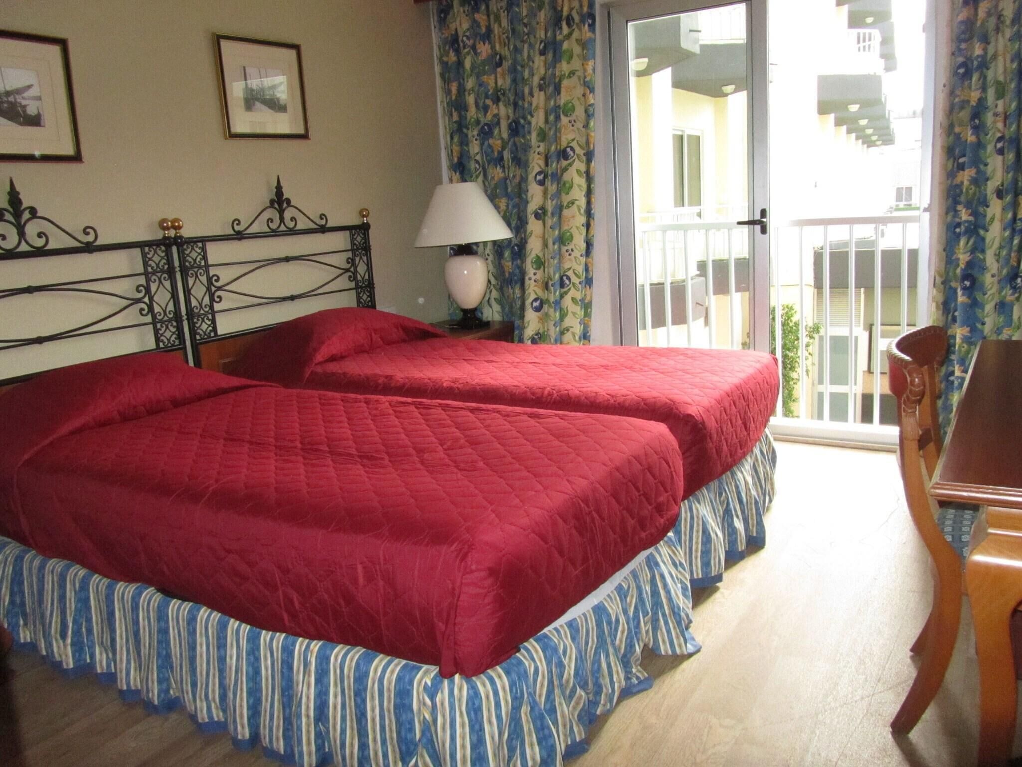 In-room safe, desk, blackout drapes, iron/ironing board