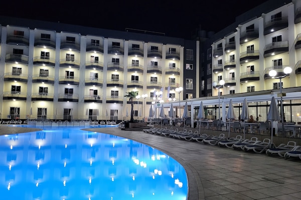 Indoor pool, outdoor pool, open 8:00 AM to 6:00 PM, pool umbrellas
